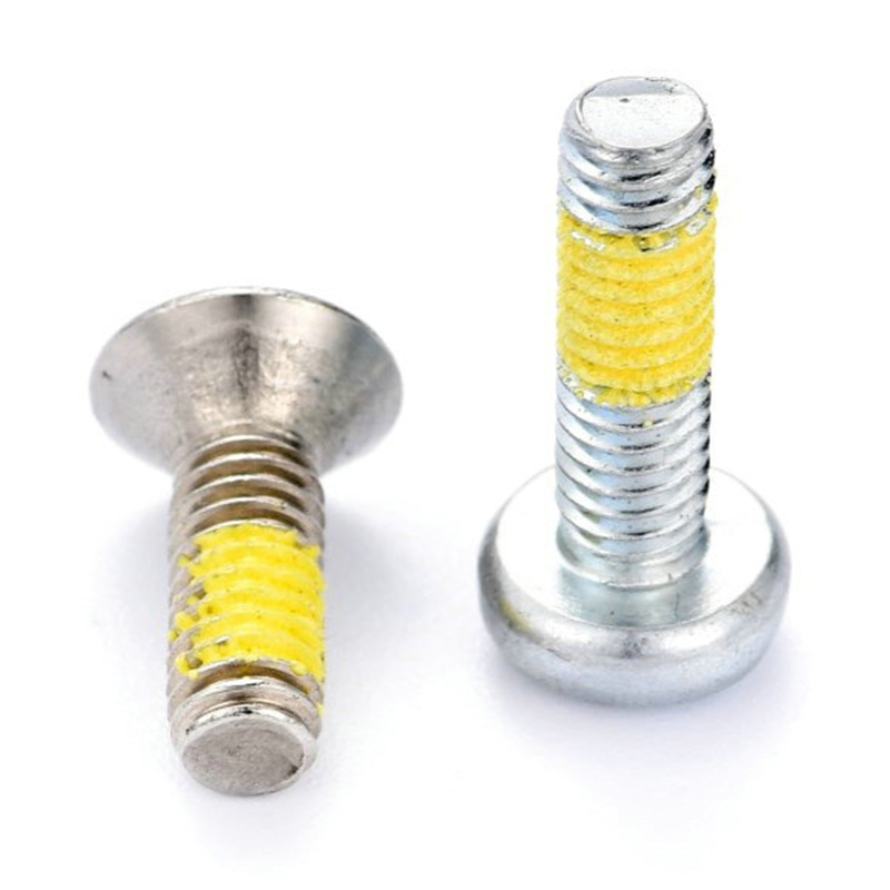 Винт с потайной головкой Torx (шестигранник) и желтой нейлоновой нашивкой Винт с потайной головкой Torx (шестигранник) и желтой нейлоновой нашивкой