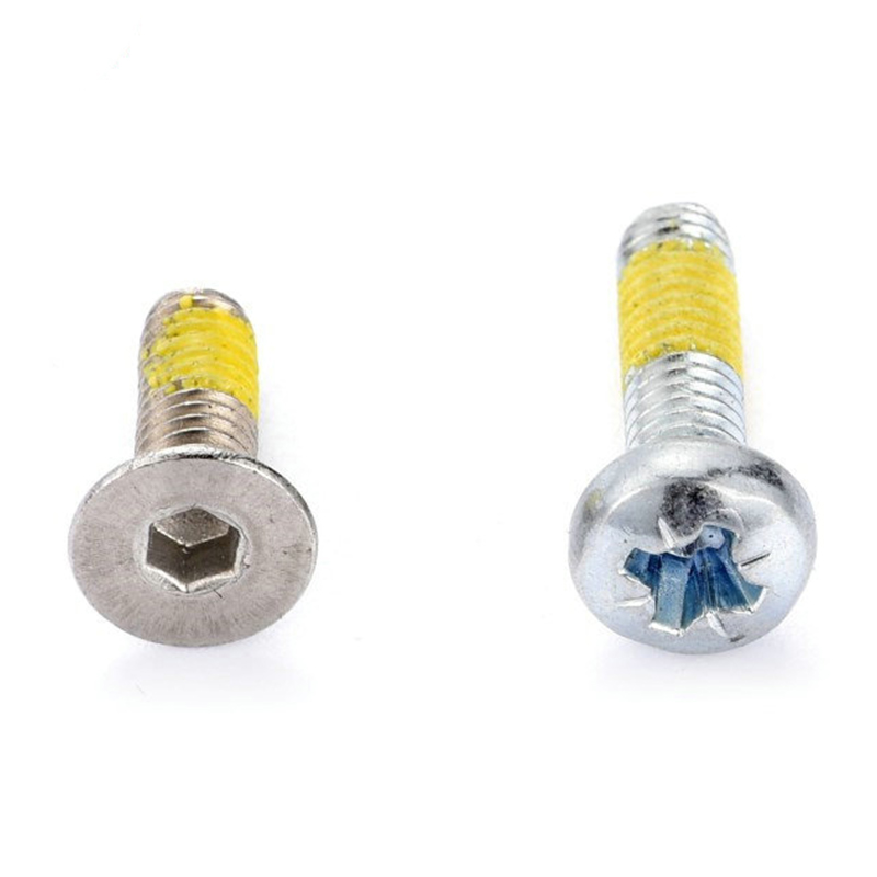 Винт с потайной головкой Torx (шестигранник) и желтой нейлоновой нашивкой Винт с потайной головкой Torx (шестигранник) и желтой нейлоновой нашивкой